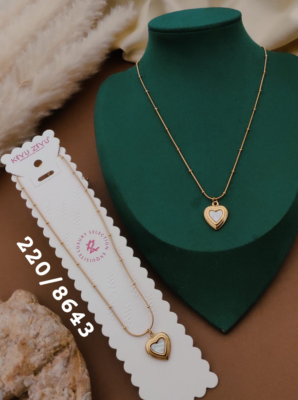 Gold Heart Pendant Necklace with White Center Detail