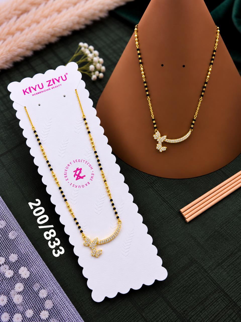 Gold-Tone Crescent Cross Mangalsutra with Sparkling Stone Details