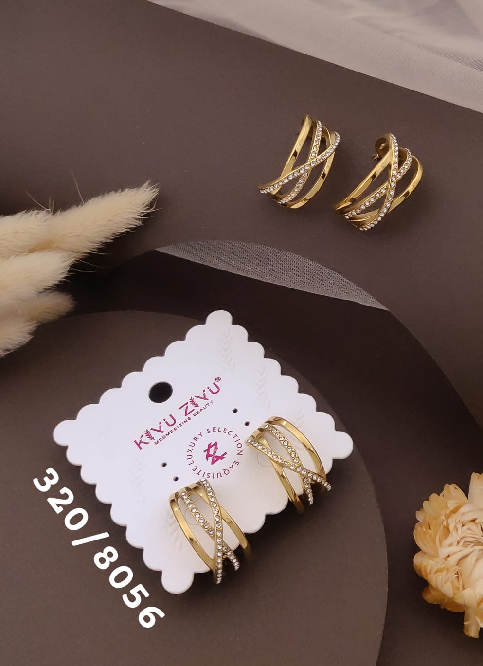 Golden Crystal Twist Hoop Earrings