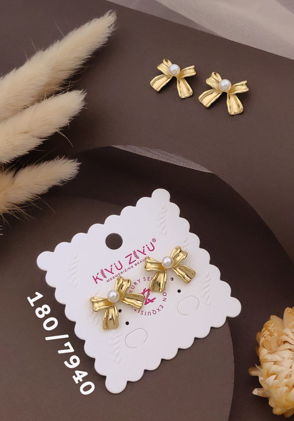 Golden Bow Pearl Stud Earrings