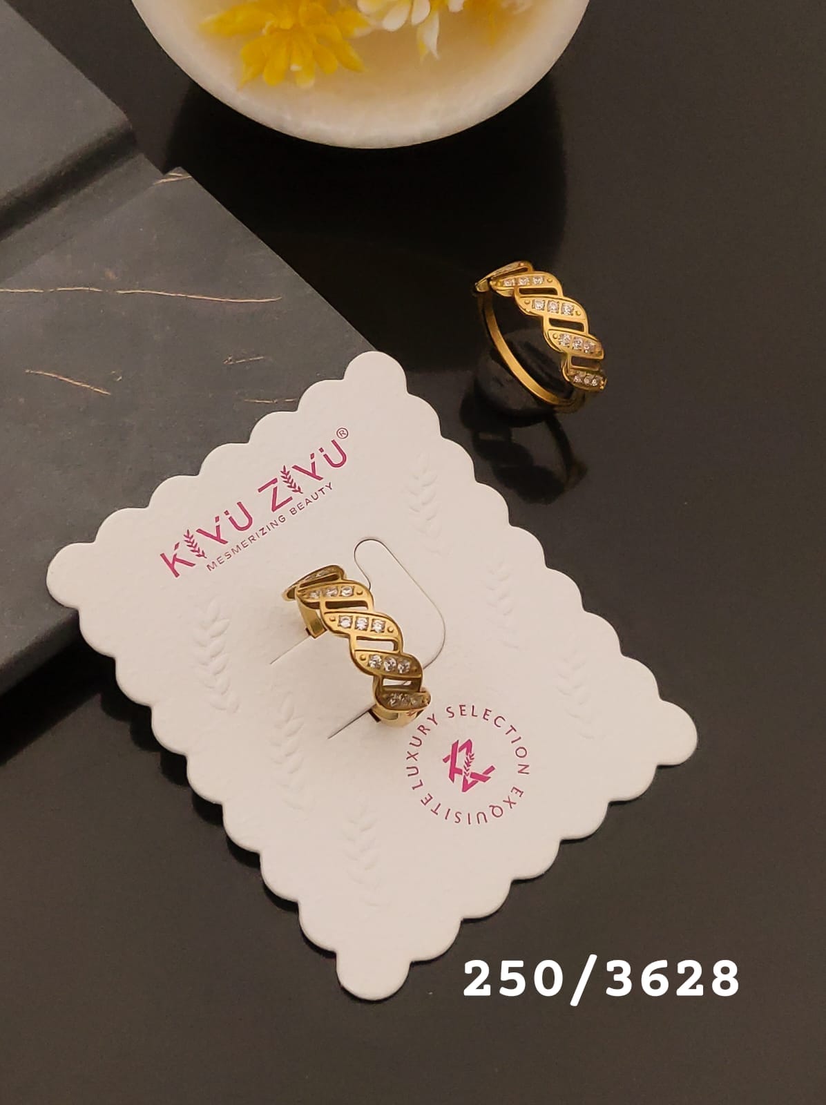 Elegant Gold-Tone Twisted Crystal Statement Ring