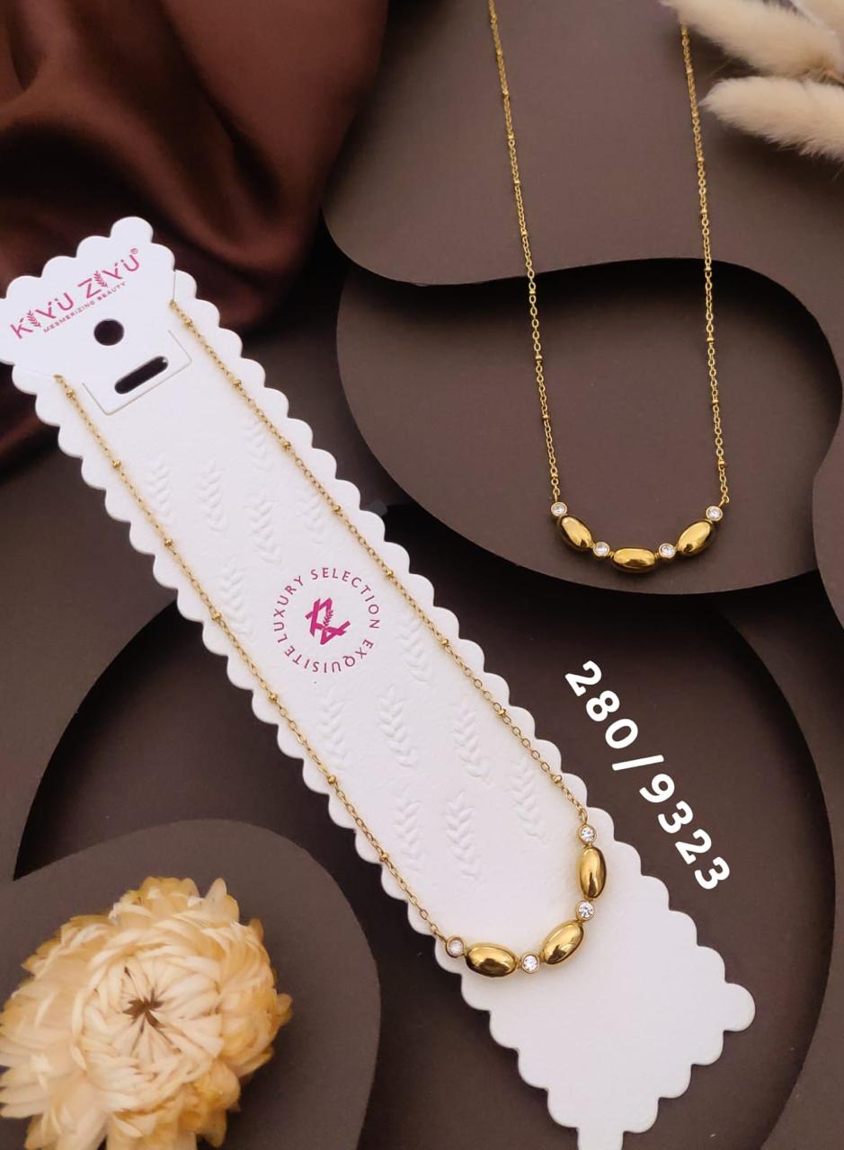 Elegant Gold-Tone Pebble & Crystal Necklace