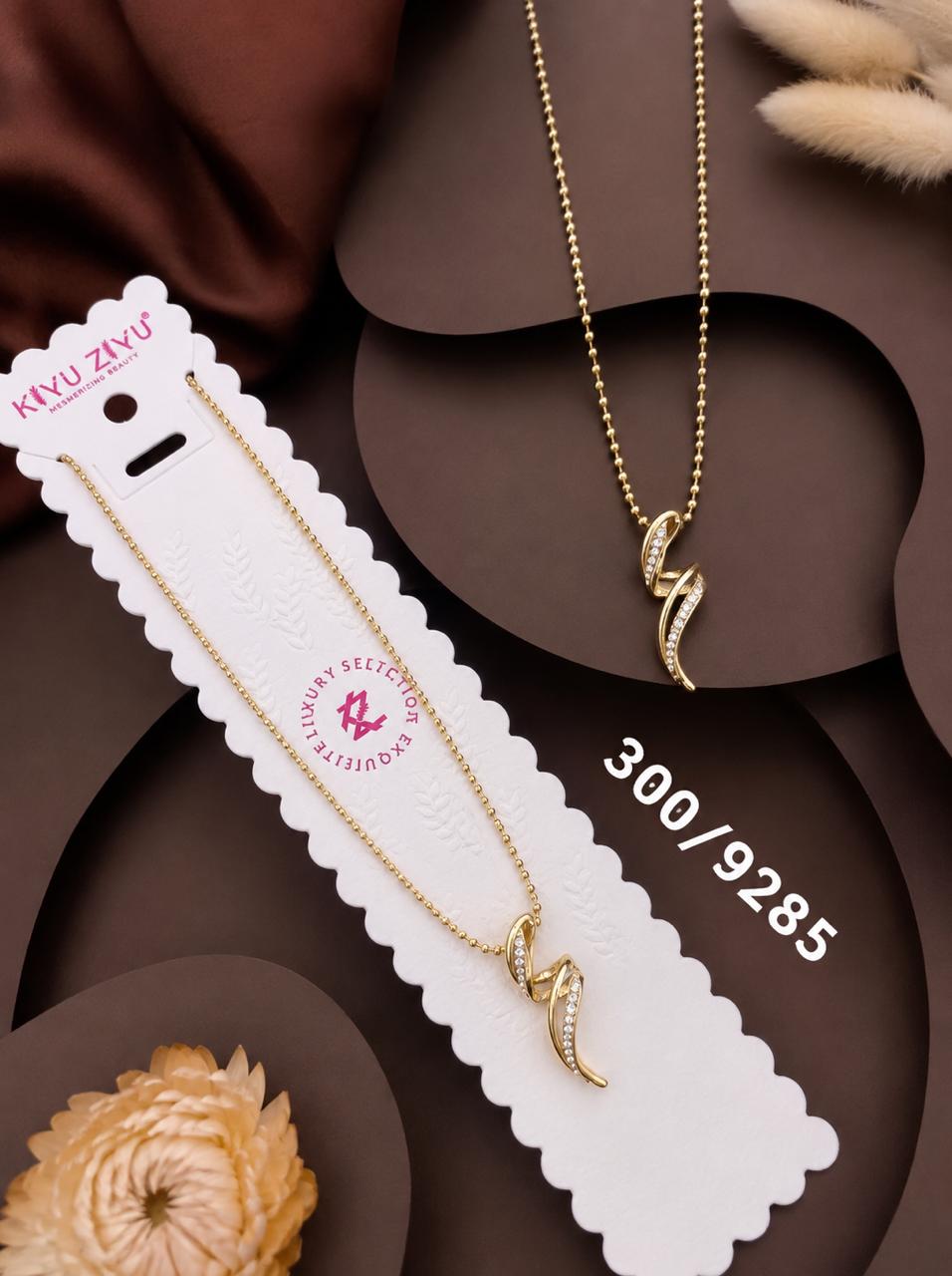 Elegant Crystal Twist Pendant Gold-Tone Necklace
