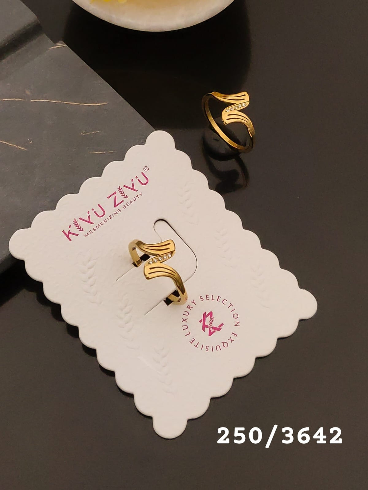 Elegant Gold-Tone Wave Design Crystal Ring