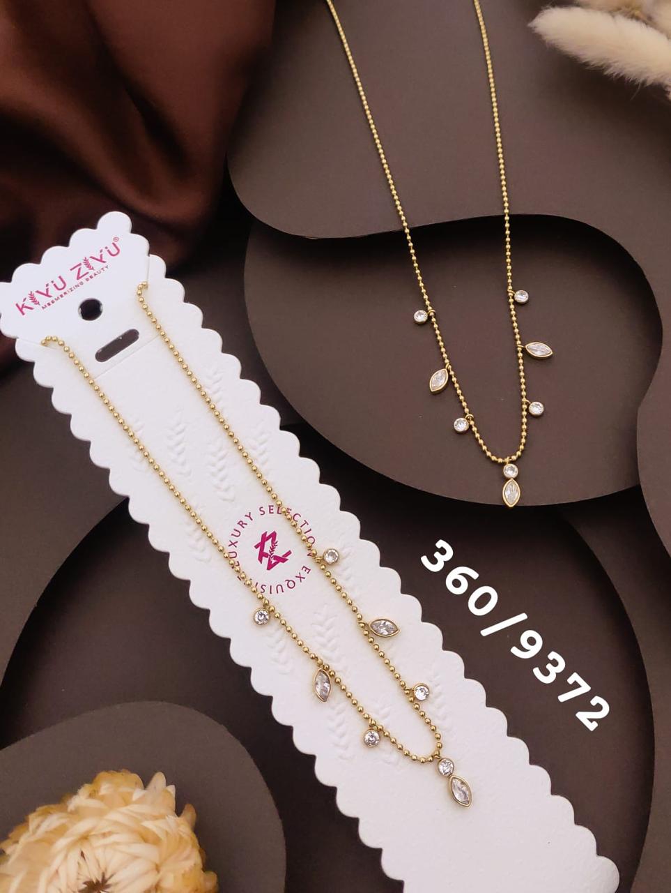 Elegant Crystal Leaf Drop Gold-Tone Necklace